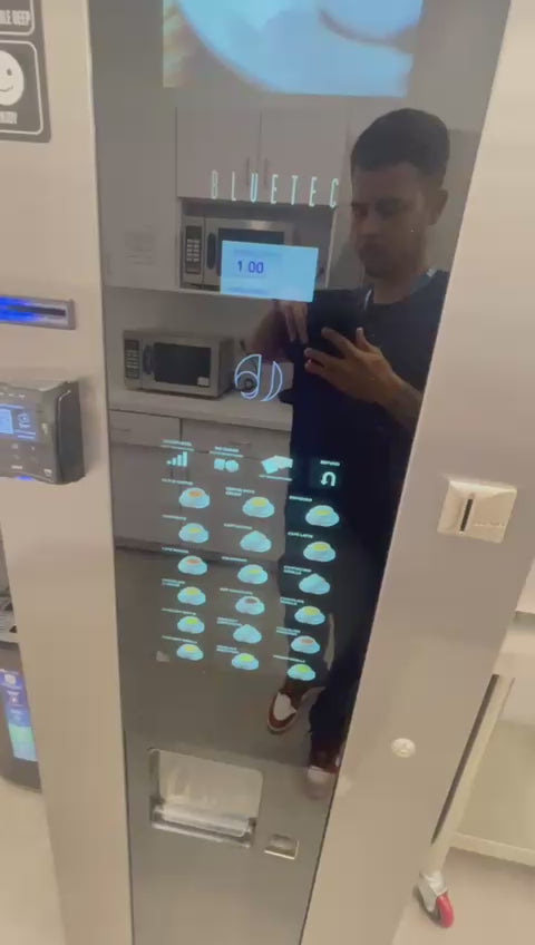 Load video: The video shows a customer using an ExpressCup Vending machine to purchase a coffee. He selects his drink on the panel, the machine brews it automatically, and a fresh, steaming cup is dispensed. The scene highlights the speed, cleanliness, and coffee-quality experience of the machine.